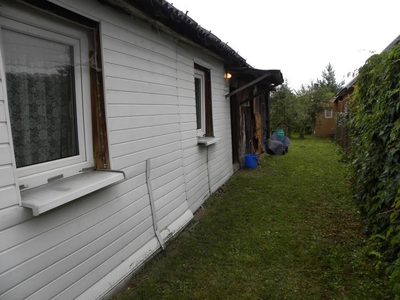 Dom z drewna przy Wiśle ul. Modrzycka w Dęblinie. - 2