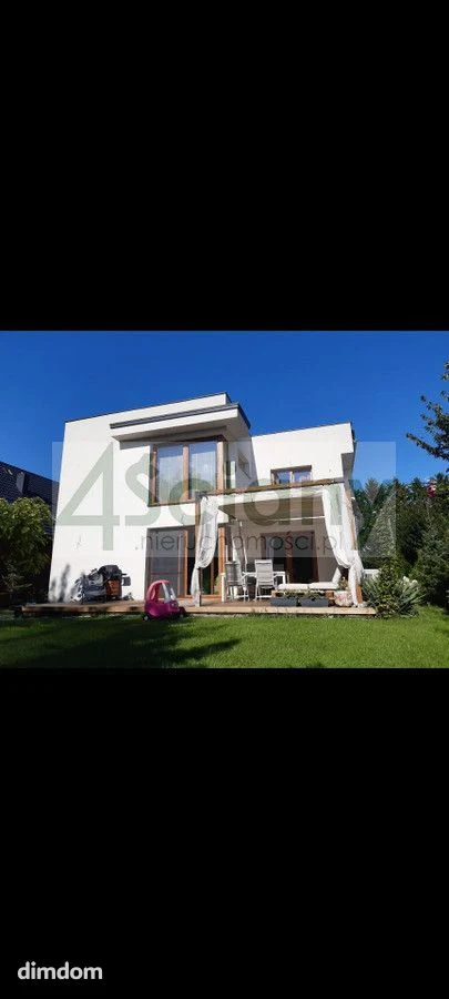 Atrakcyjny dom na sprzedaż, zlokalizowany na warszawskim Wawrze, w dzielnicy Wawer Las, w bliskim sąsiedztwie Gocławia. - 98202167.jpg