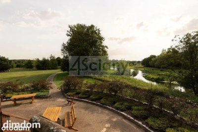 Zrealizowany projekt domu , Dwór Chmielniki z dachem krytym strzechą, położonego w cichej i malowniczej miejscowości Królewo, w gminie Joniec. - 2