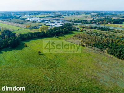 Działka inwestycyjna 35000  m2 przy trasie S 8 w pobliżu Mc Donald, 500 m do południowego wiaduktu - zjazdu z trasy S8 , 5 km w lini prostej do aquaparku Suntago. W okolicy jest planowana duża obwodn… - 2