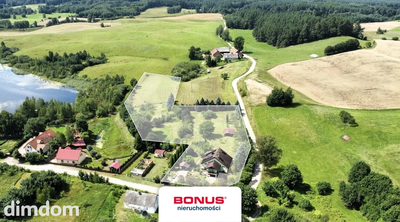 Dom nad jeziorem z dużą zagospodarowaną działką
