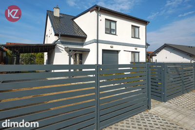 Nowoczesny dom w zabudowie bliźniaczej | Zawada | okolice Piły | 106,80 m² | garaż w bryle