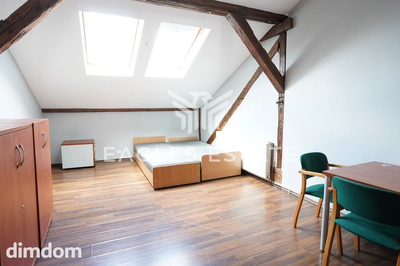 Mieszkanie dwupoziomowe w kamienicy w centrum