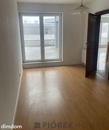 Dwupoziomowe mieszkanie z tarasem w Ząbkach - 114744920.jpg