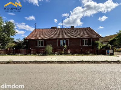 Dom z dużą działką i zabudowaniami