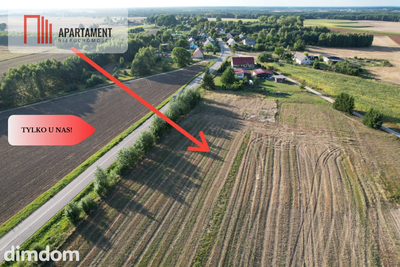 Działka budowlana blisko jeziora i lasu.