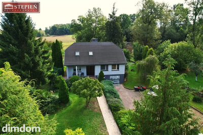 Dom z przepięknym ogrodem i dużą działką